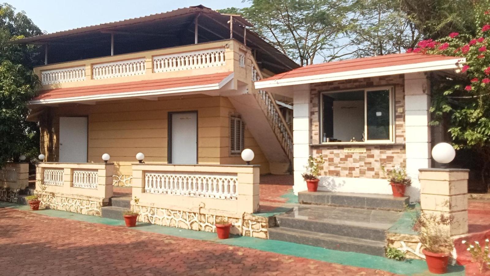Giriraj Garden Resort Vagholi  Eksteriør billede